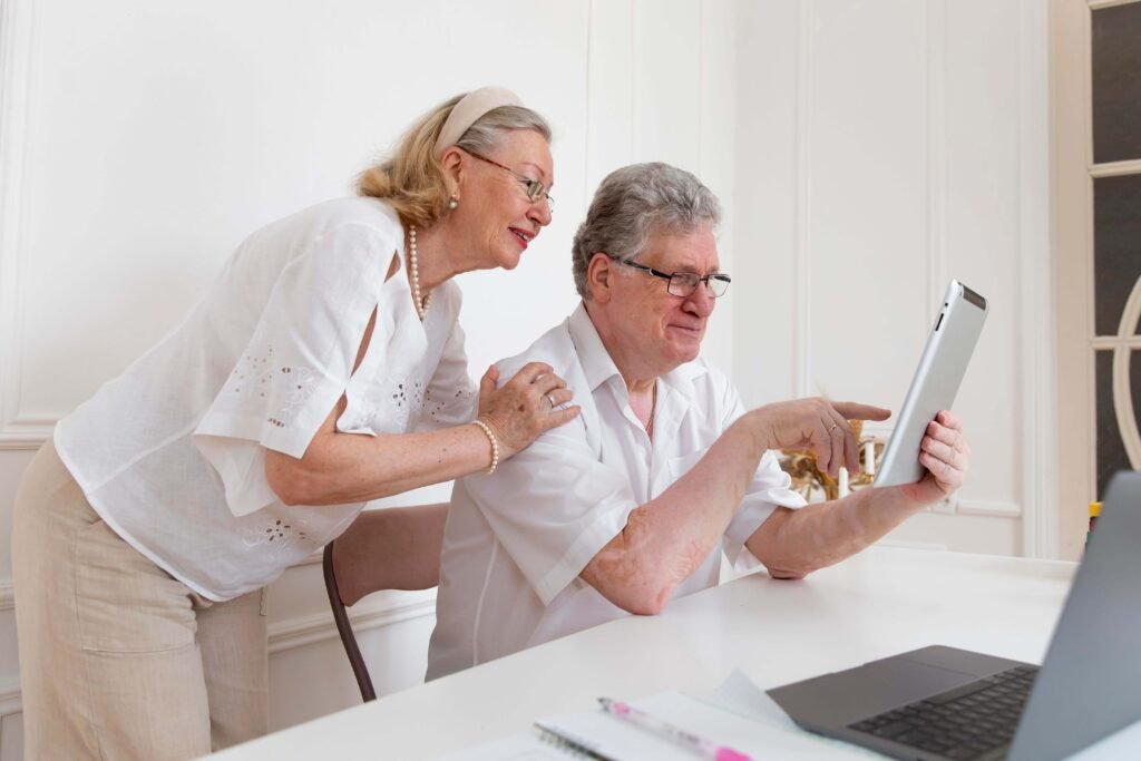 Adult couple interacting with a tablet